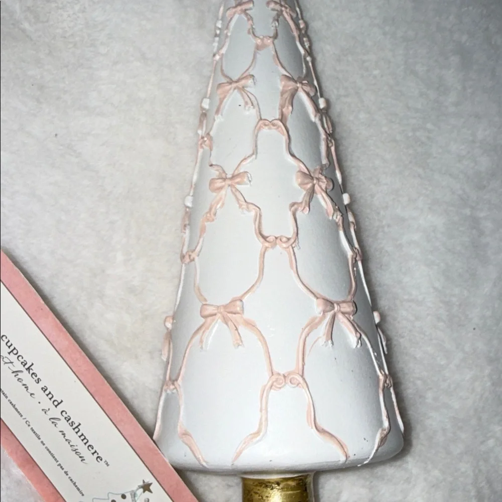Cupcakes and cashmere Christmas Tree pink bows across white cone & gold base